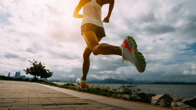 A photo of a woman running.