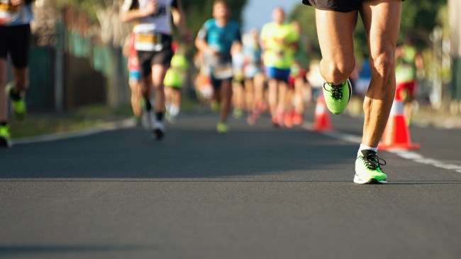 A view of runners' feet during a race.