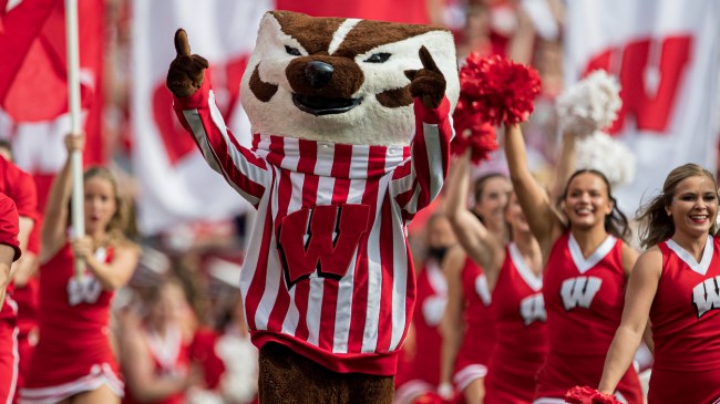 The Wisconsin Badgers mascot runs onto the field.