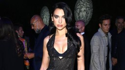 Dua Lipa Celebrates New #1 Hit Song With Barbie Inspired Bikini While Laying On Grass