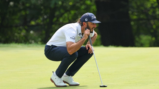 Max Homa lines up a putt at the BMW Championship.