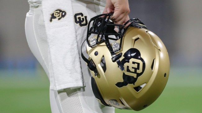 A Colorado Buffaloes logo on a football helmet and uniform.