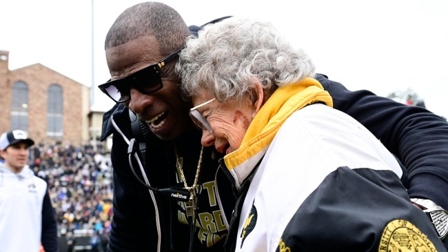 Deion Sanders with Colorado superfan Peggy Coppom at the spring game.