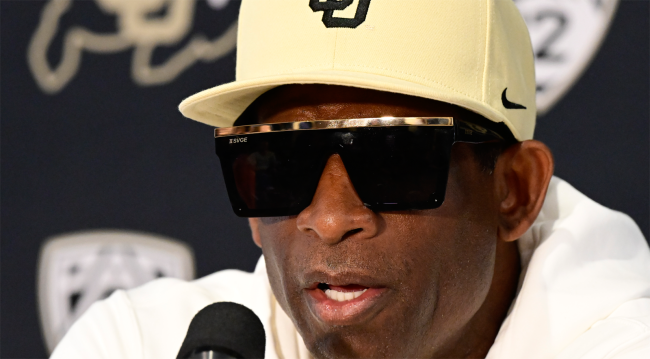 deion sanders wears sunglasses at press conference