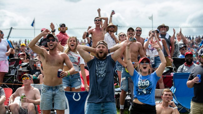 Race fans celebrate the finish at the Indy 500.