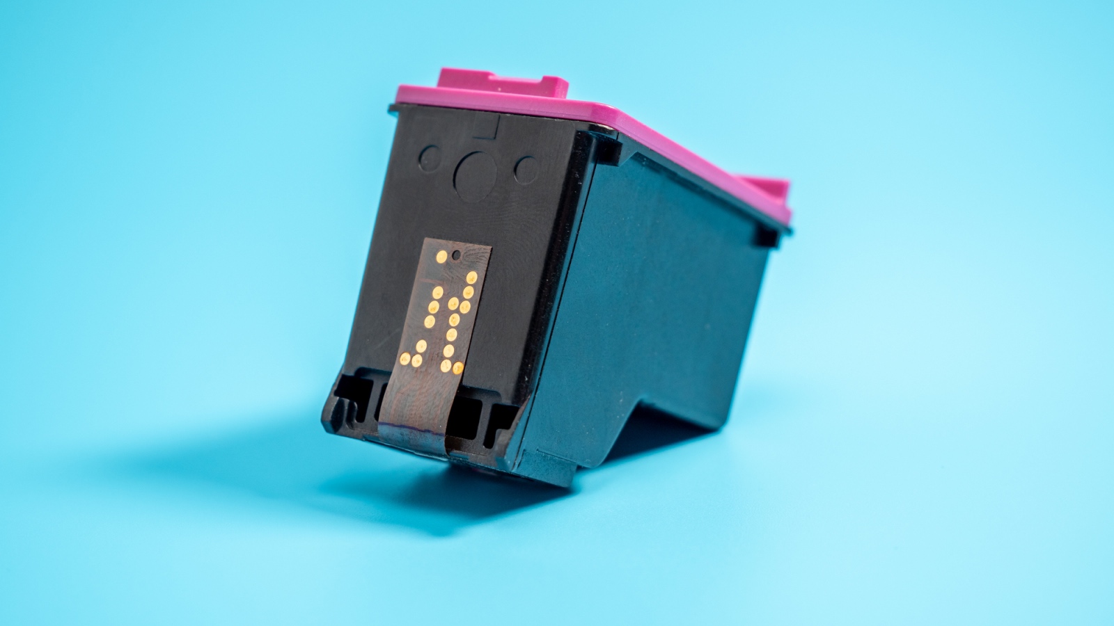 printer ink cartridge on blue background