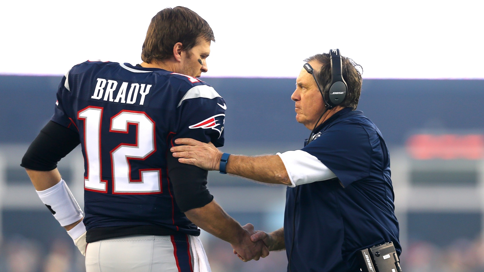 Tom Brady and Bill Belichick shaking hands