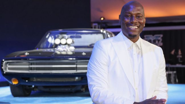 tyrese wearing a white suit at the premiere of fast x