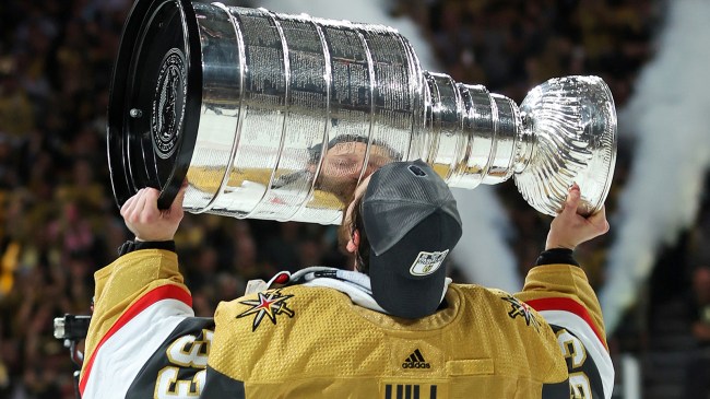 Golden Knights goalie Adin Hill kissing Stanley Cup