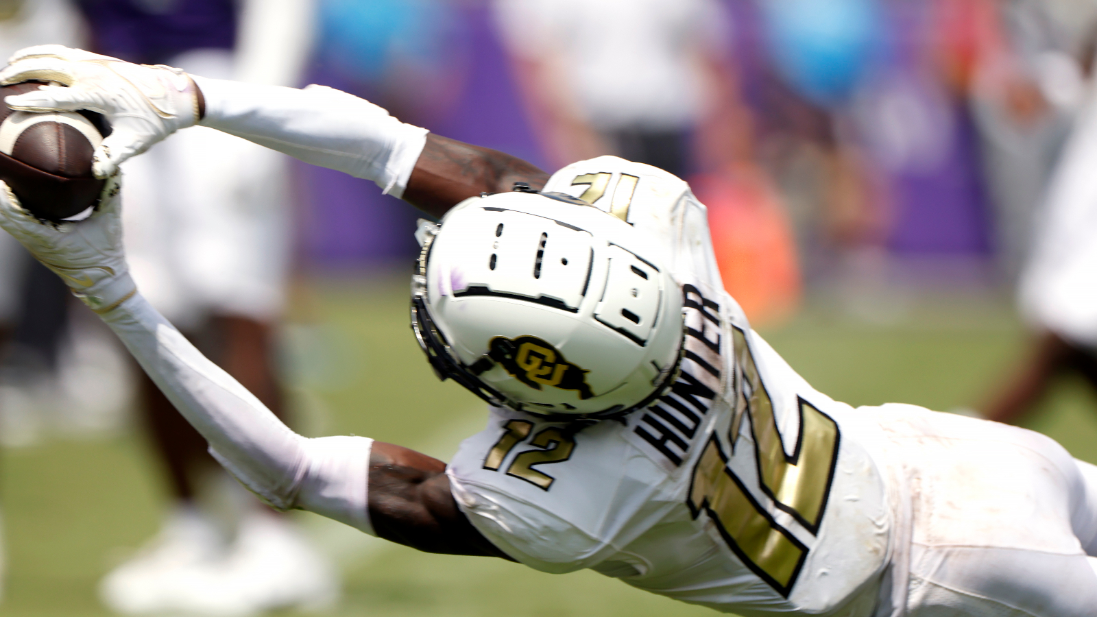 Seminoles fan burns his Deion Sanders jersey after FSU loses recruit