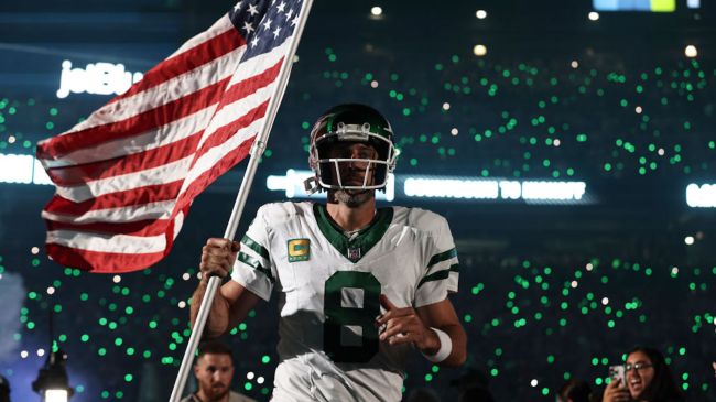 aaron rodgers holding the american flag