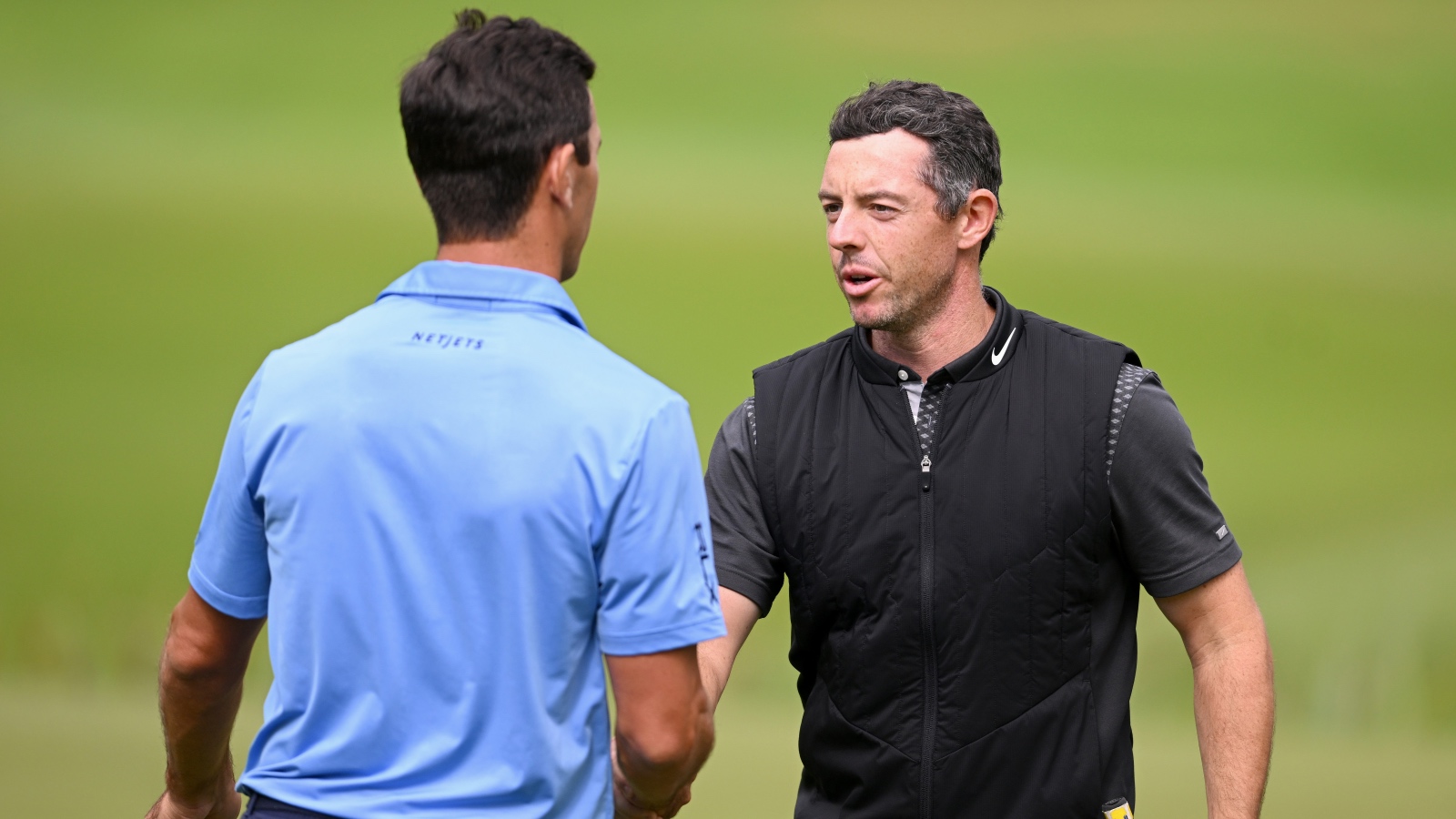 Billy Horschel shaking hands with Rory McIlroy