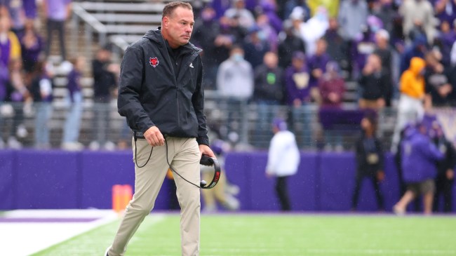 Butch Jones walks off the sidelines during a game between Arkansas State and Washington.