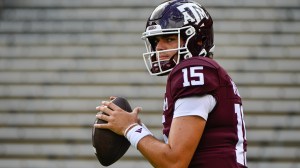 Conner Weigman warms up before Texas A&M's matchup with Auburn.