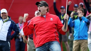 Golf fan David Johnson celebrates after sinking putt to win bet at 2016 Ryder Cup