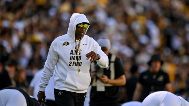 Deion Sanders on the field before a game between Colorado and Nebraska.