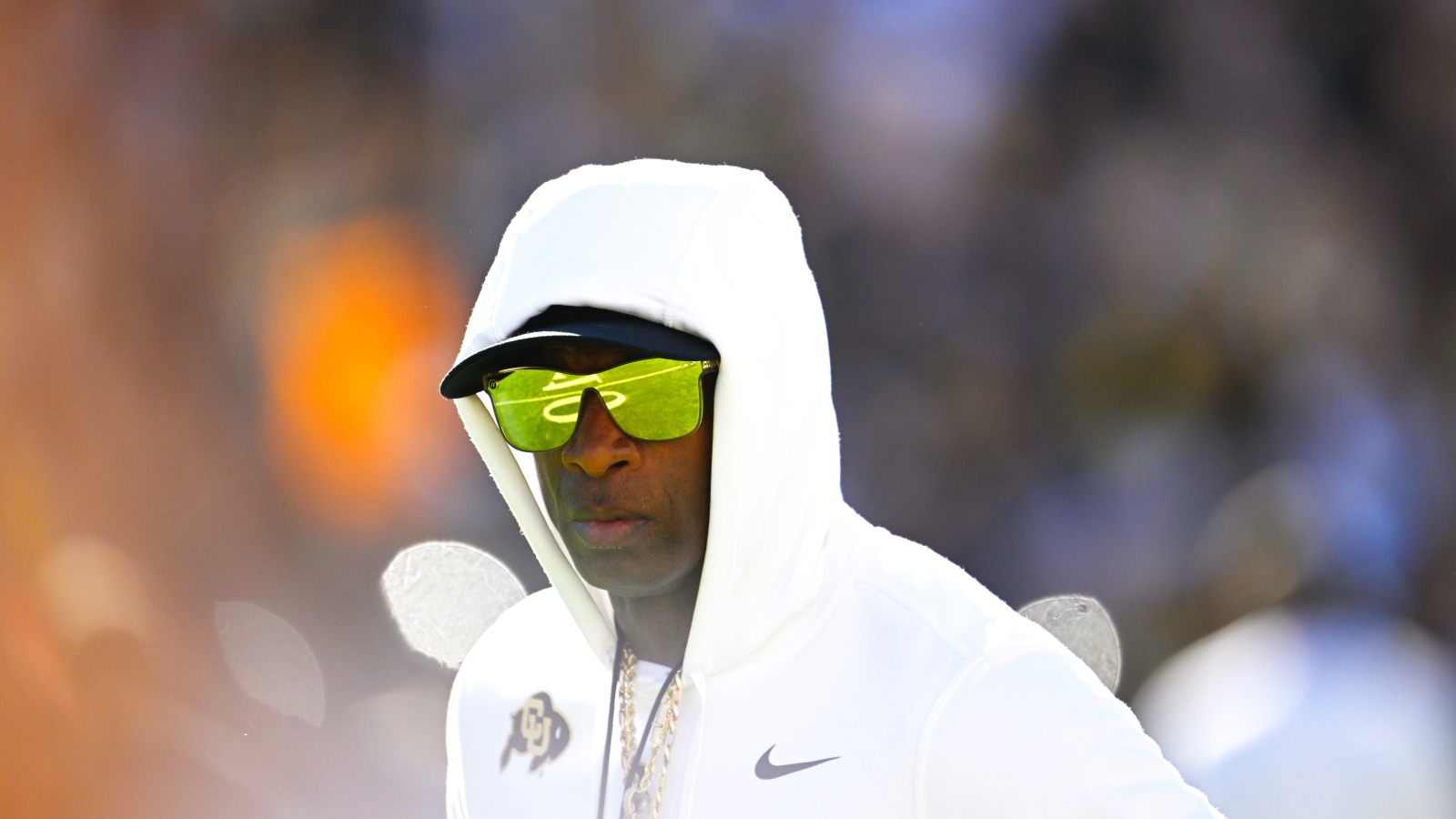 Colorado Buffaloes head coach Deion Sanders wearing sunglasses
