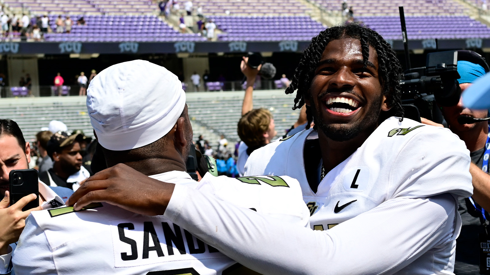 Deion Sanders and Son Shilo Share Warm Embrace Before Colorado Debut