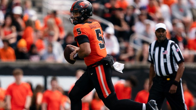 DJ Uiagalelei scrambles during the Oregon State spring game.