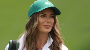 jena sims caddies at the masters for brooks koepka