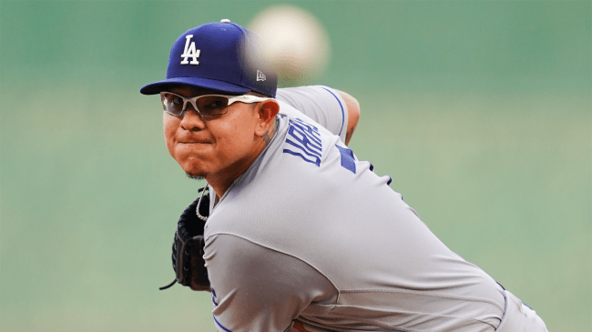 julio urias throws a pitch for dodgers