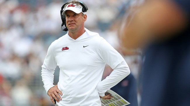 Lane Kiffin watches from the sidelines during a game between Ole Miss and Mercer.