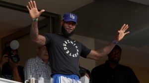 LeBron James waves to the crowd during an MLB game between the Dodgers and Marlins.