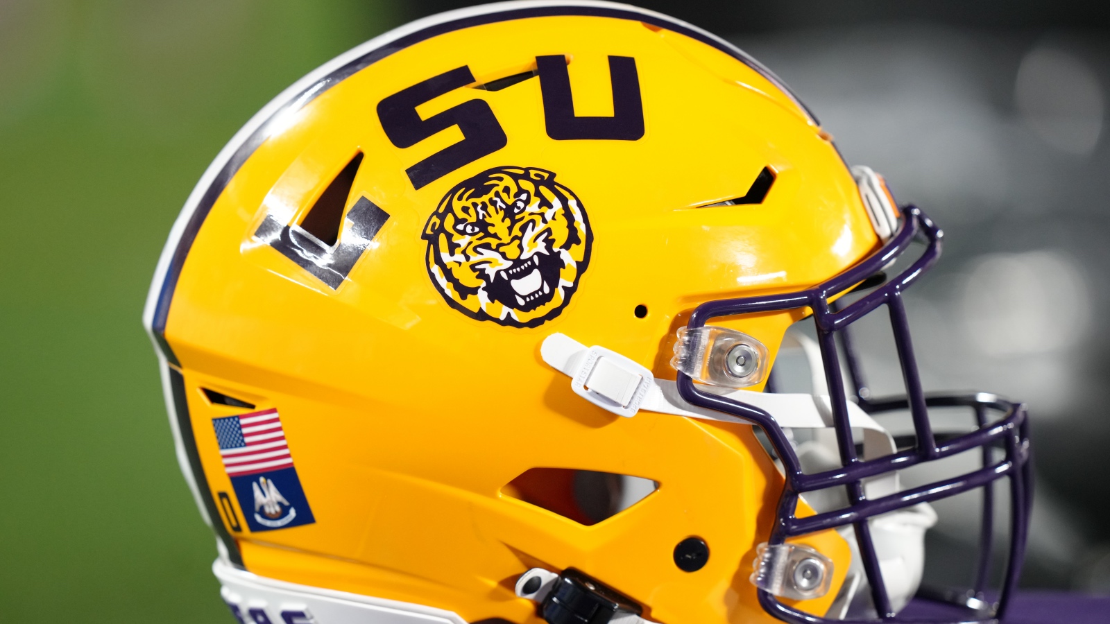 Louisiana State Tigers LSU football helmet under the lights