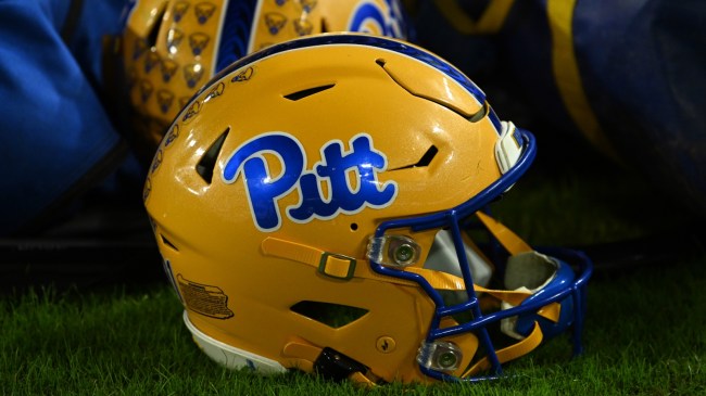 A Pitt Panthers helmet on the sidelines before a game.