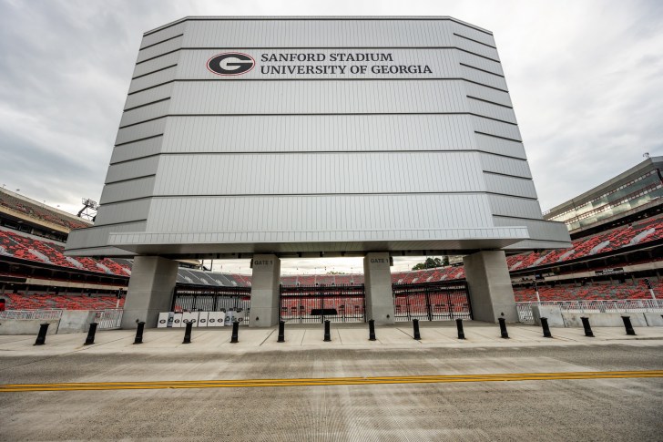 The Back of Sanford Stadium Scoreboard With The Stadium In The Background
