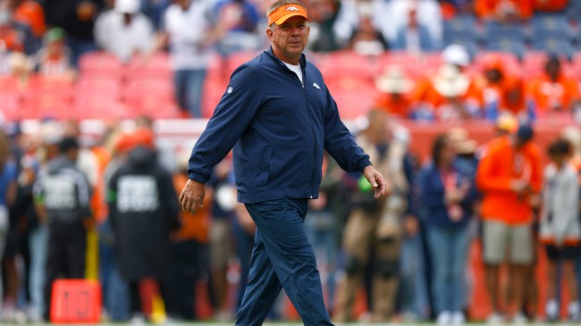 Sean Payton walks the field before a Denver Broncos game.