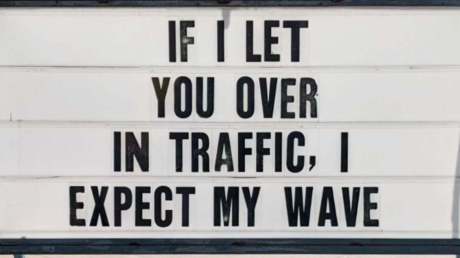 funny meme sign about traffic and waving
