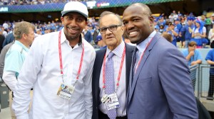 Stephen A. Smith poses for a photo with Joe Torre and Harold Reynolds at the World Series.
