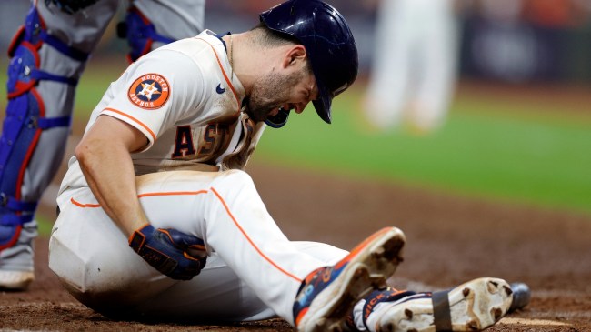 Chas McCormick grimaces after being hit by a pitch in the ALCS.