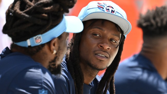 DeAndre Hopkins talks to a Tennessee Titans teammate.