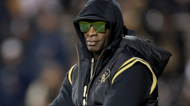 Deion Sanders on the field before a game between Colorado and Stanford.