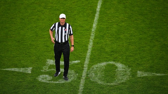 A referee makes a call during a game between Notre Dame and Navy.