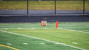 A view of the goal line on a high school football field.