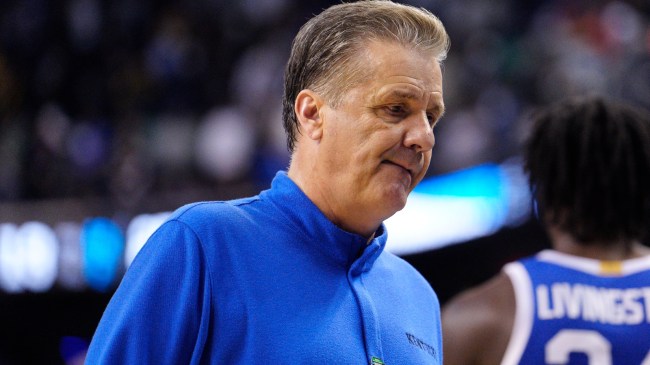 John Calipari reacts on the sidelines during a Kentucky basketball game.