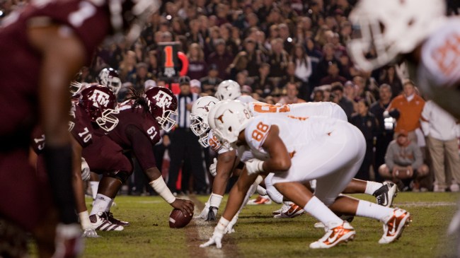 Players from Texas and Texas A&M at the line of scrimmage.