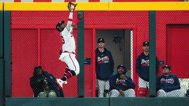 Michael Harris makes an incredible catch on the wall before recording a game-ending double play.