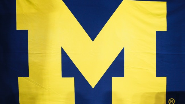 A Michigan Wolverines logo on a flag.