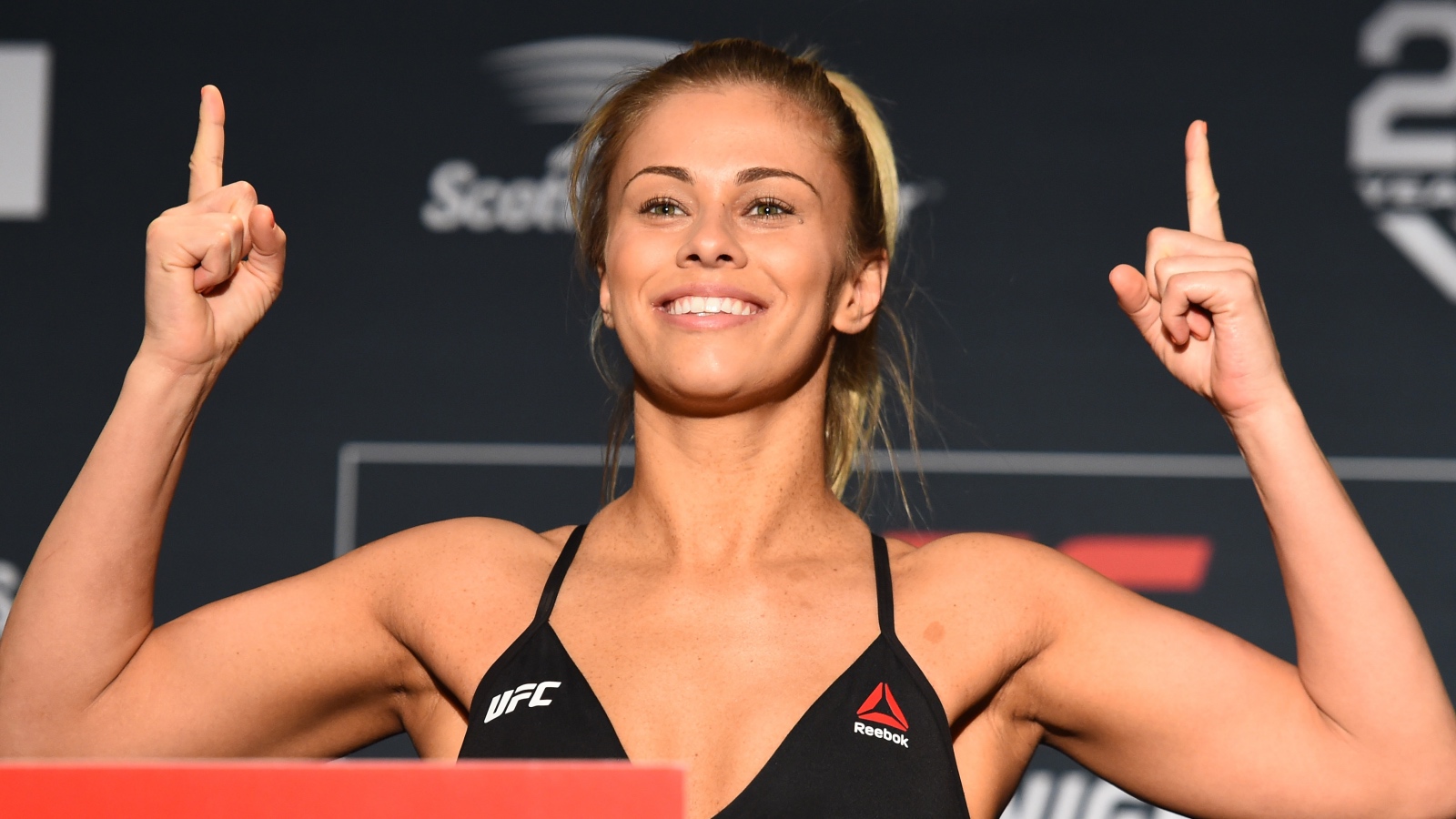MMA star Paige VanZant smiling at a weigh-in