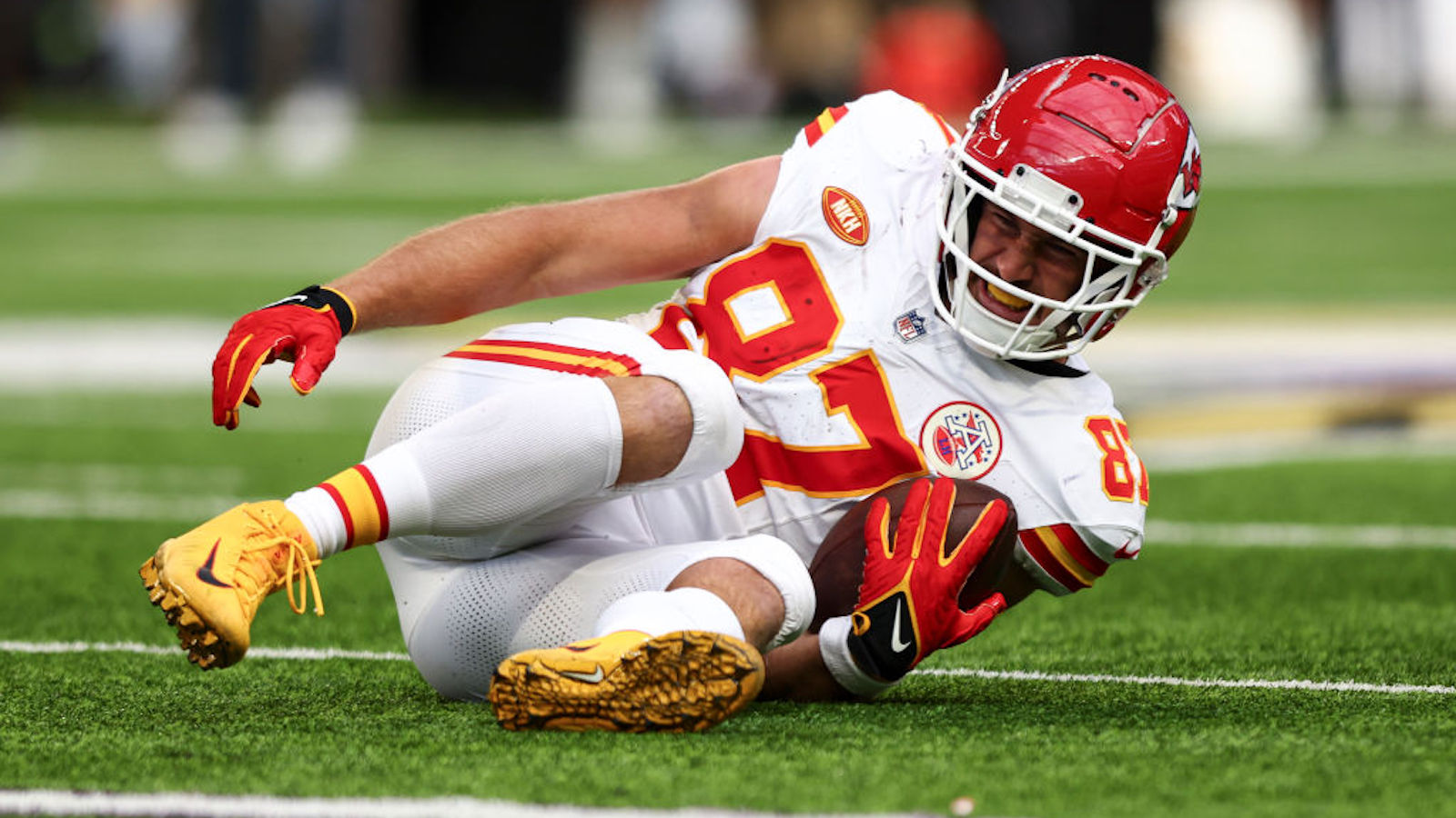 NFL Fans, Swifties Debate Video Of Travis Kelce Looking Up