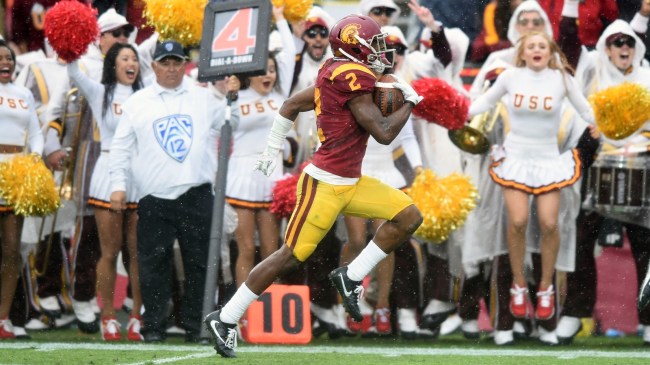 USC's Adoree Jackson returns a punt in the rain against Notre Dame.