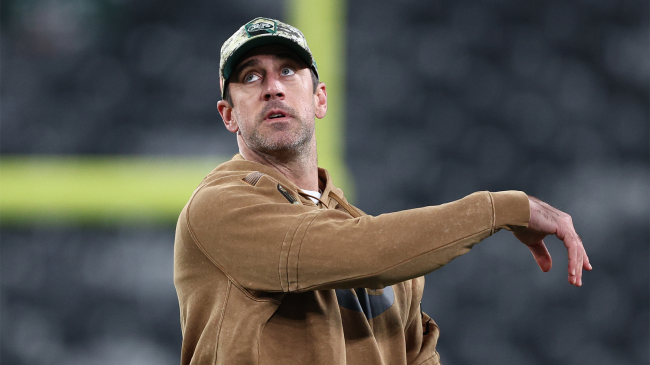 Aaron Rodgers of the New York Jets throws a football before the game