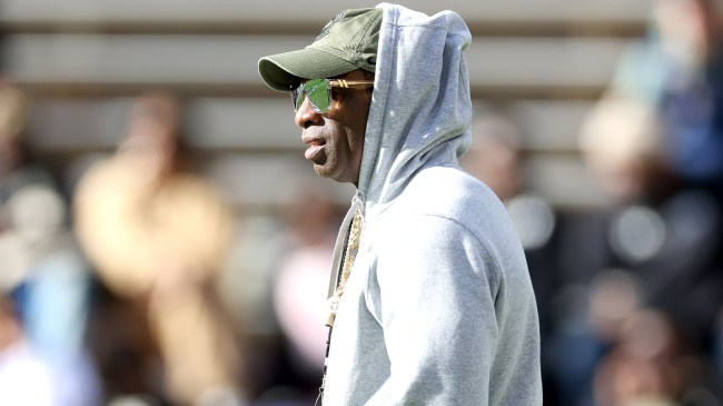 Deion Sanders on the field before a game between Colorado and Arizona.