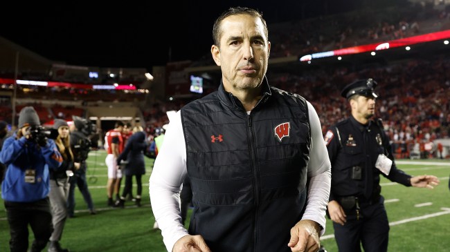 Luke Fickell walks off the field after a Wisconsin football game.