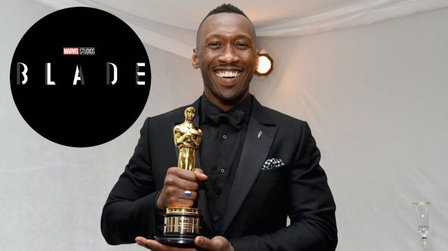 Mahershala Ali holding an oscar