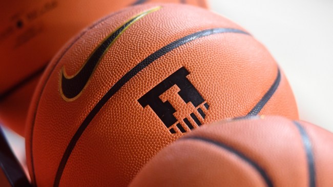 An Illinois logo on a basketball.